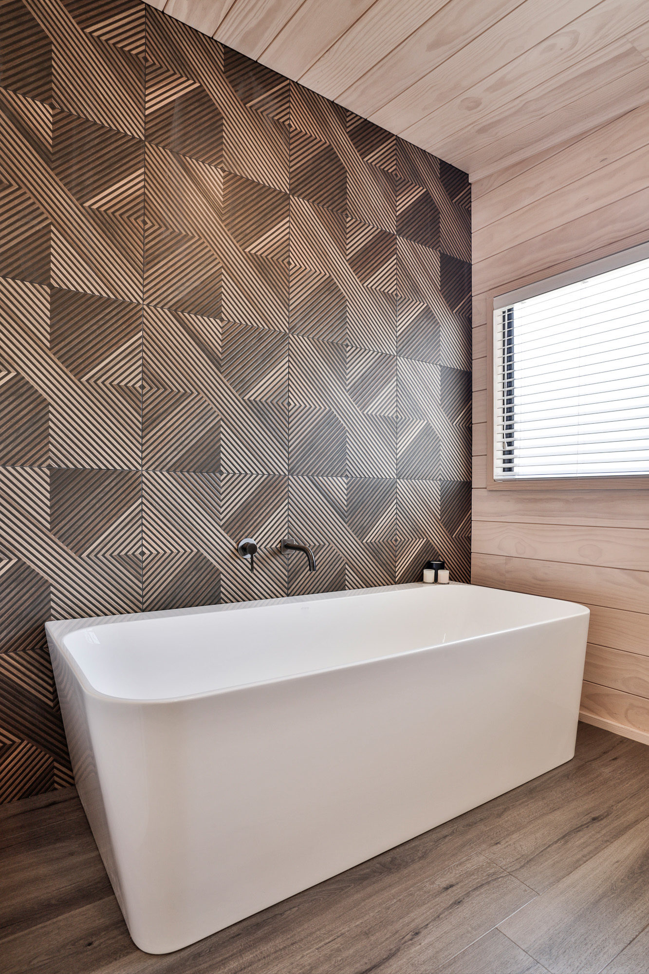 Stunning tiled feature wall in bronze Lockwood show home Wellington